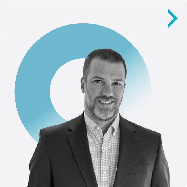Coby Aldridge, Senior Product Owner for Odessa, smiling in a professional headshot.