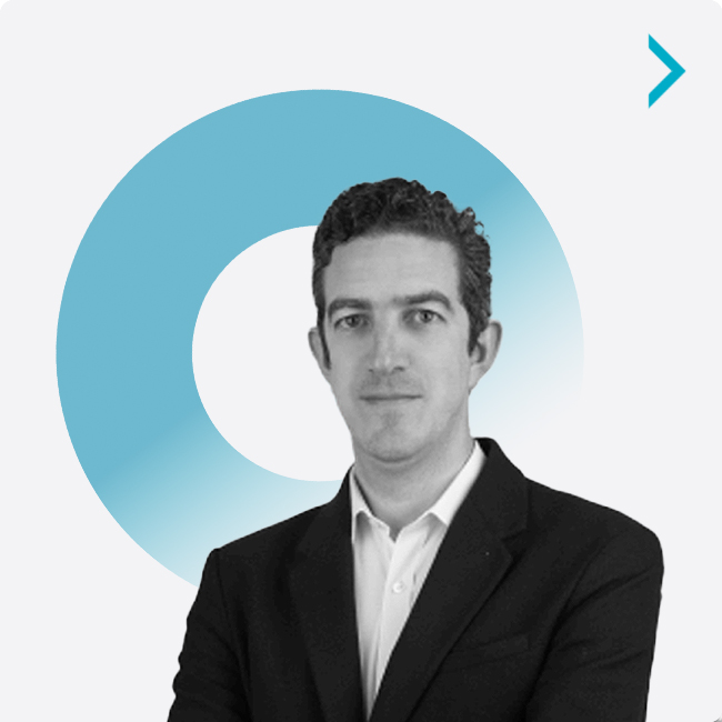 Neil Kallel, Senior Solutions Architect for Odessa, smiling in a professional headshot.